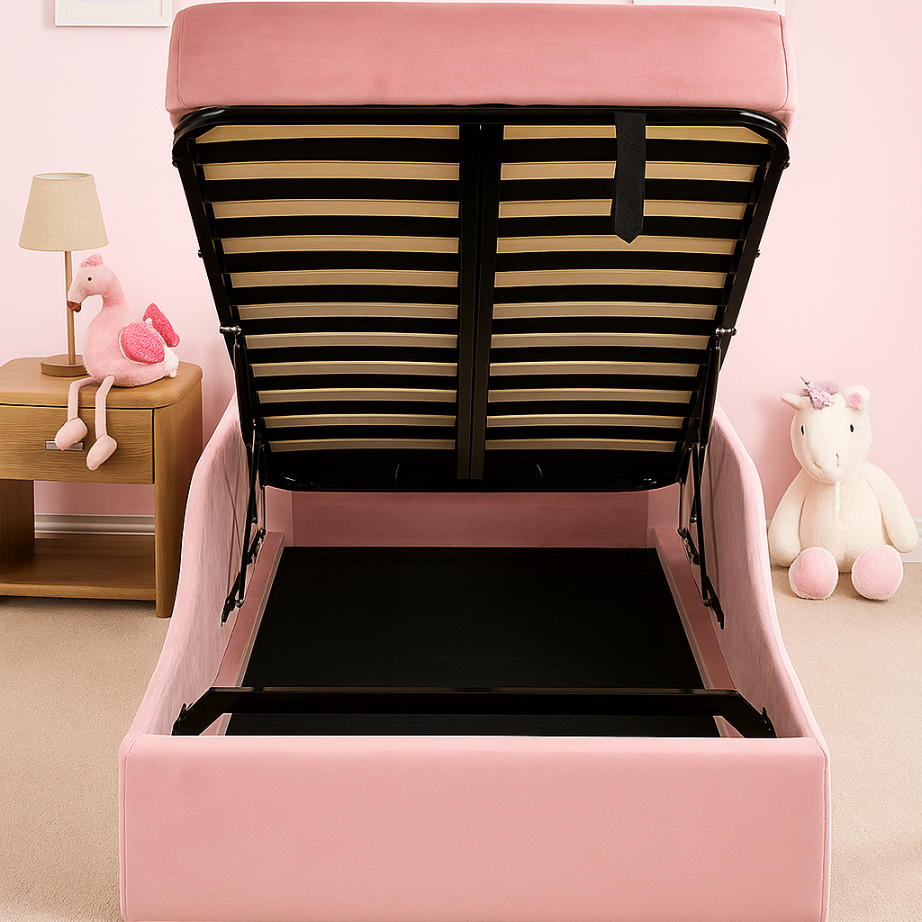 Pink children's bed with black striped mattress in a room with pink walls and toys.
