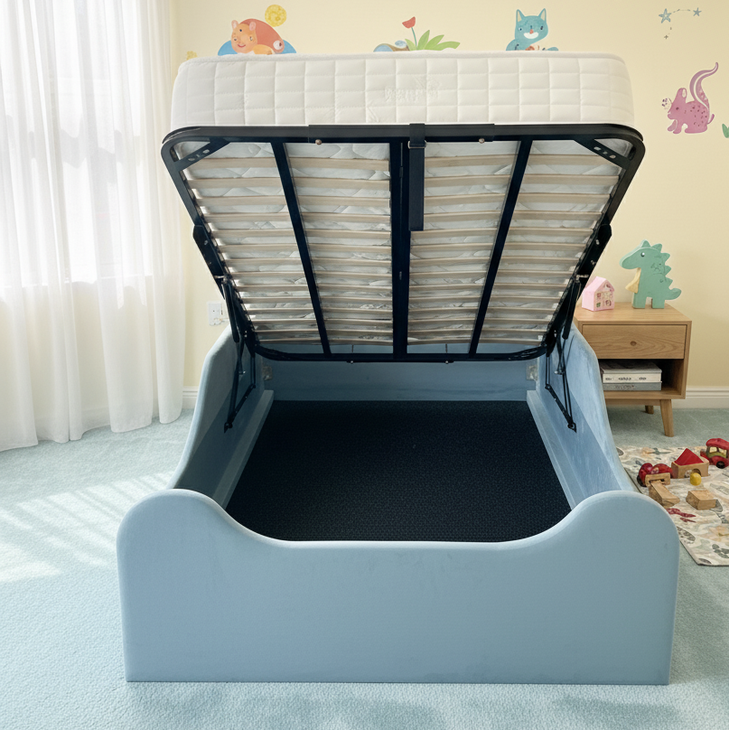 Children's bed with mattress and headboard in a room with colorful wall stickers.